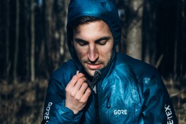  Man in forest wearing Gore-Tex Shakedry jacket
